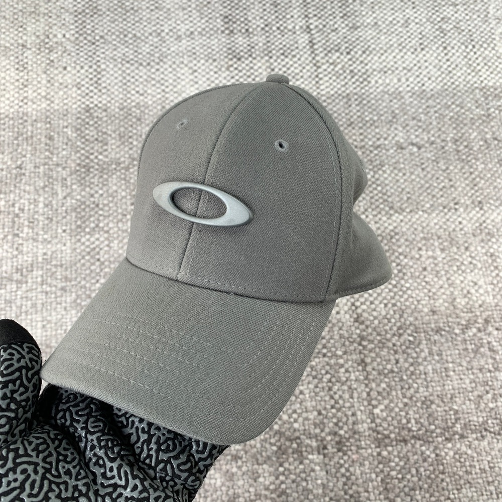 Oakley Tincan Cap Men S/M Dark Gray Metal Ellipse Stretch Fit Hat 911545-23Q